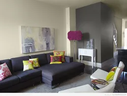 One wall of a different color in the living room interior