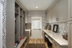 Kitchen and hallway with the same wallpaper photo