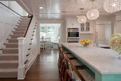 Kitchen With Stairs To The Second Floor Design Photo