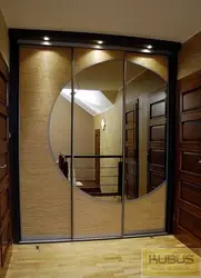 Built-in wardrobe in the hallway with one mirror photo