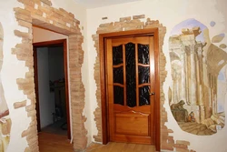 Finishing Doors With Decorative Stone In The Hallway Photo