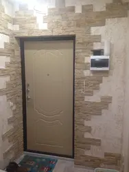 Finishing Doors With Decorative Stone In The Hallway Photo