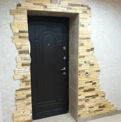 Finishing Doors With Decorative Stone In The Hallway Photo