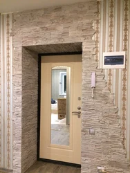 Finishing Doors With Decorative Stone In The Hallway Photo