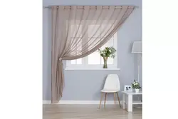 Tulle and curtains in the kitchen living room photo