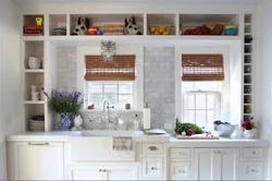 Photo of a kitchen with shelves and cabinets on the wall
