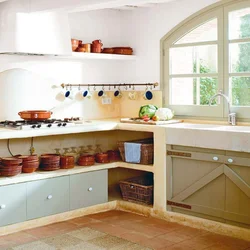 Photo of a kitchen with shelves and cabinets on the wall