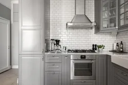 Gray tiles white kitchen photo