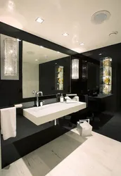 Bathtub with black suspended ceiling photo