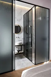 Photo of bathroom doors with glass