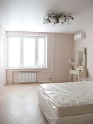 Matte white stretch ceiling in the bedroom photo