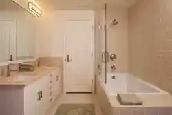 Bathroom design wall along the bathtub
