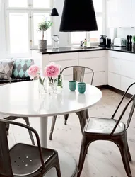 Kitchen interior with black table and chairs photo