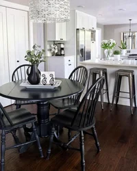 Kitchen interior with black table and chairs photo