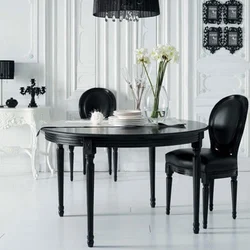 Kitchen interior with black table and chairs photo