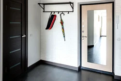 Entrance Door With Mirror In The Hallway Interior