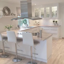 Interior of a bright kitchen with a bar counter
