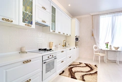 Kitchen design in light colors with tiles
