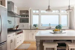 Kitchen interior stove by the window