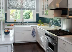 Kitchen interior stove by the window