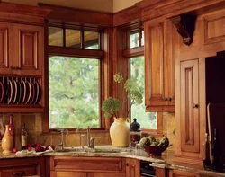 Window design in the kitchen in a wooden house