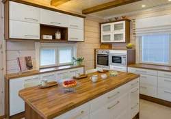 Window design in the kitchen in a wooden house