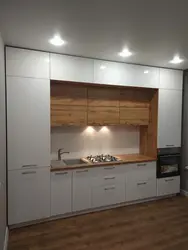 White kitchens up to the ceiling with wood photo