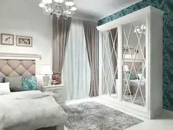 Photo of wardrobes with a mirror in the bedroom photo