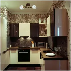 Kitchen design with dark wallpaper