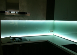 Photo of a kitchen with backlit tape