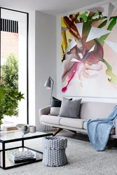 Living Room Wall Design With Paintings