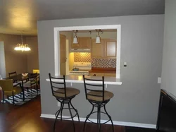 Window from the kitchen to the living room photo