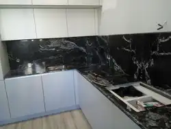 White Marquina marble countertop in the kitchen interior