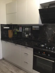 White Marquina marble countertop in the kitchen interior