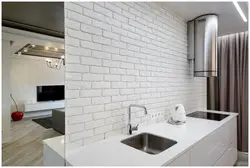 Brick wall in the kitchen design photos with your own