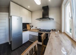 Kitchen design in Brezhnevka 6 m with a refrigerator