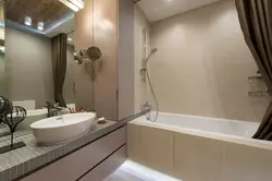Gray bathroom with beige photo