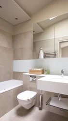 Photo of bathrooms combined with a toilet in a modern