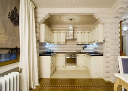 Kitchen design in a house made of rounded logs