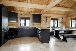 Kitchen design in a house made of rounded logs