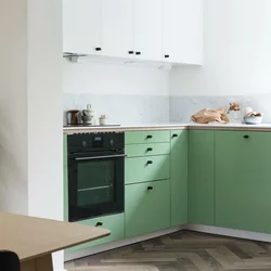 Green top white them in the kitchen photo