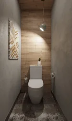 Toilet in apartment finished with laminate photo