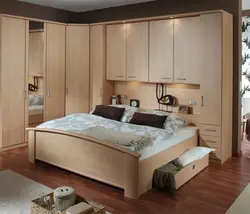 Спальні з кутняй шафай дызайн і ложкам