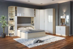 Bedrooms with corner wardrobe design and bed