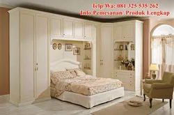 Bedrooms with corner wardrobe design and bed