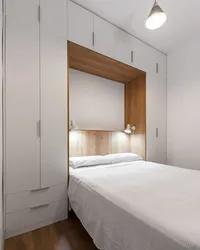 Bedroom design bed and small wardrobe