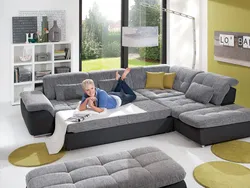 Photo of a sofa in the living room with a sleeping place