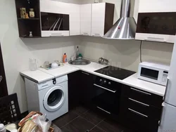 Small kitchen design with washing machine and refrigerator