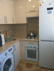 Small kitchen design with washing machine and refrigerator
