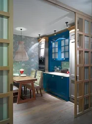 Kitchen interior with door to room